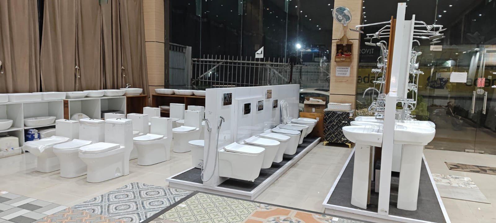 Row of Kerovit WCs and wash basins